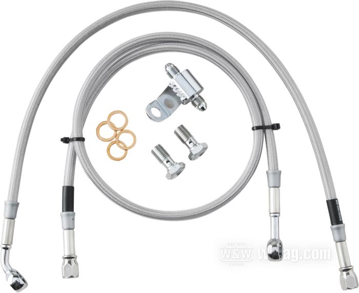 Brake line kit by Goodridge; fits FLST 1986-1999; stainless steel / PTFE liner, braided clear coat, banjo 3/8” 0° → banjo 3/8” 45°, with T connector for brake-light switch; length: 131 cm; position: rear; with parts certificate; gross weight: 340 g