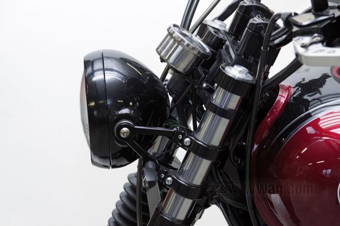 Headlight complete »Scrambler« by LSL; steel, black, with chrome bezel; depth: 125 mm; Ø 165 mm; for headlight insert (Ø): 5-3/4”; bulb type: H4 / W5W; 12 V; 60/55 W; socket: P43t / W2.1x9.5d; with 12 V bulb; with insert; with position light function; E4 approved; gross weight: 938 g