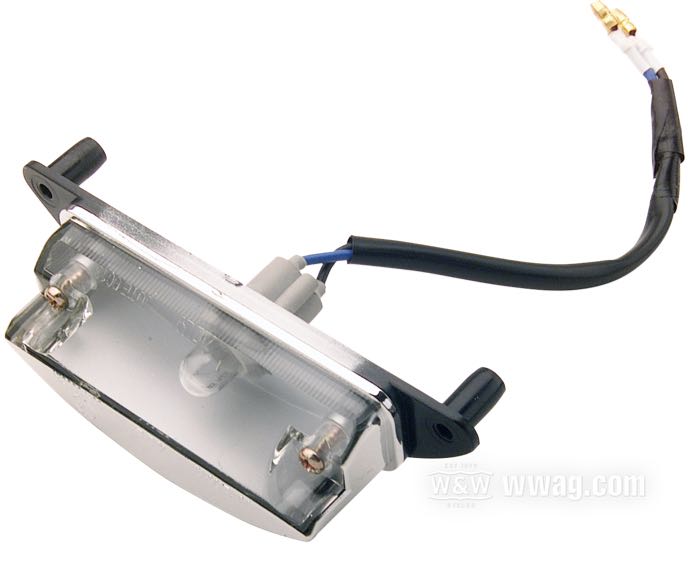 Illuminazione targa »Mezzaluna«; uscita del fascio a 45°; plastica, cromato; L x A x P: 119 x 35 x 29 mm; tipo di lampadina: W5W; 12 V; basetta: W2.1x9.5d; omologato E3; peso lordo: 60 g