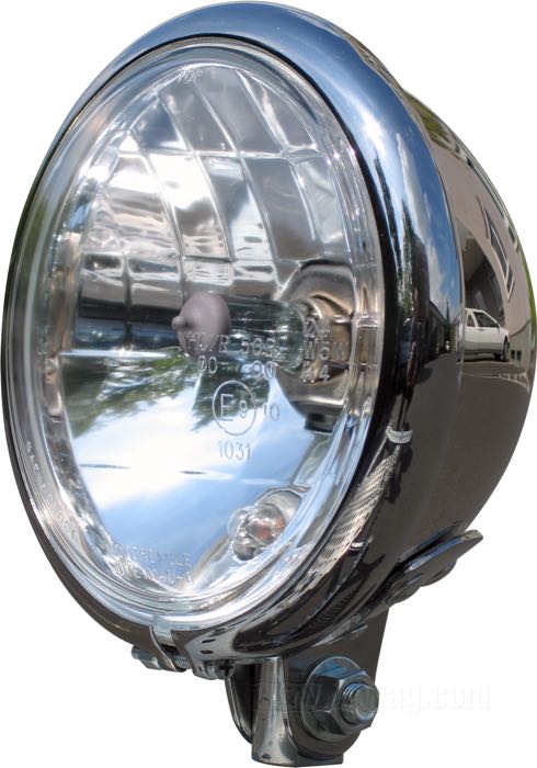 Óptica de faro »Prism H4 + Parking«; aluminio fundido / cristal, claro; Ø 5-3/4”; tipo de bombilla: H4 / W5W; 6 o 12 V; casquillo: P43t / W2.1x9.5d; sin bombilla; con función de luz de posición; reemplaza OEM HD 67696-81A, 67698-81B y 67757-92; homologado E9; peso bruto: 420 g