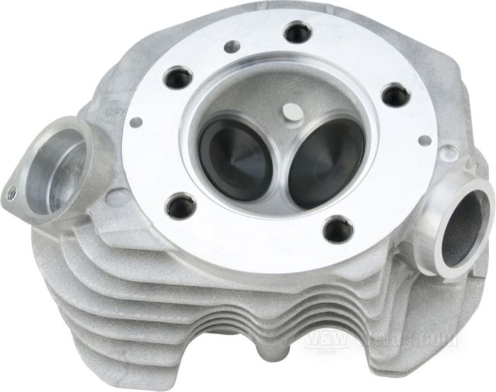 Cylinder head »Super Stock« by S&S; fits Shovelhead 1979-1984; cast aluminum / steel / spring steel; nominal bore: 3-7/16 ” / 3-1/2 ”; exhaust flanges G: Shovelhead; head bolt pattern: Shovelhead; intake manifold flanges: Shovelhead, rubberband type (1979-1984); oil supply: external; plug threads: 1 x M14 x 1.25 x 19 mm; gross weight: 11.64 kg