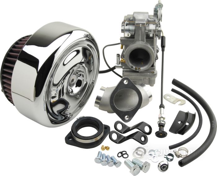Carburatore a valvola »HSR42« di Mikuni; atto per Big Twin 1984-1992; alluminio fuso / acciaio; con collettore, fascette e filtro aria con coperchio cromato; AVVERTENZA: usa cavi apertura/chiusura di 1990→; peso lordo: 3.75 kg