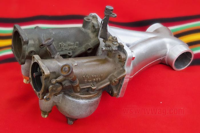 Manifold by Hammer Sycle; for two 4-bolt Linkert carbs; fits Knuckleheads 1940-1947; 85.5 mm center hole to center hole; cast aluminum, tumble polished, drilled, 5/16”; Japan; gross weight: 660 g