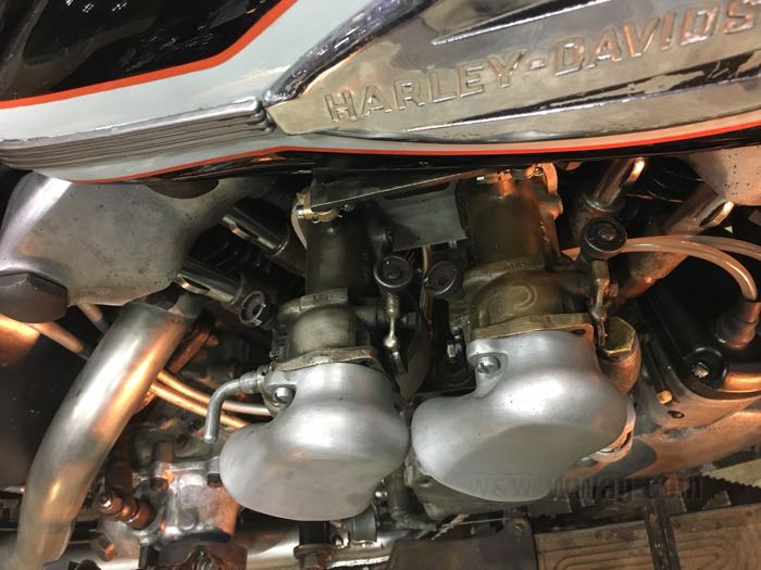 Manifold by Hammer Sycle; for two 4-bolt Linkert carbs; fits Knuckleheads 1940-1947; 85.5 mm center hole to center hole; cast aluminum, tumble polished, drilled, 5/16”; Japan; gross weight: 660 g