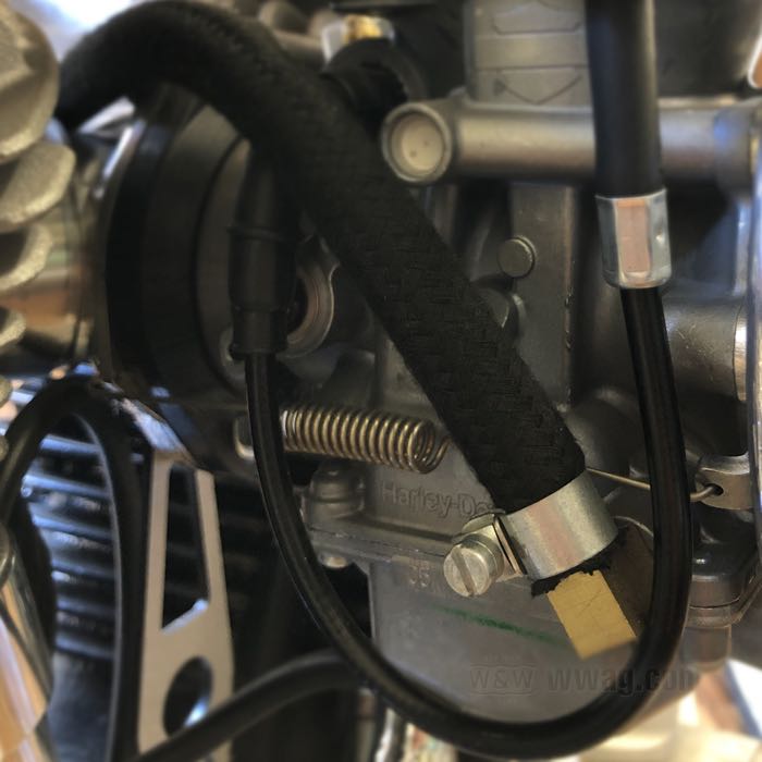 Mounting kit by Bates; for Keihin CV carburetors 1988→; for Tillotson, Bendix and Keihin (butterfly) manifolds; stainless steel / spring steel; Spigot Ø: 42 mm; mounting hole distance: 70 mm; gross weight: 157 g