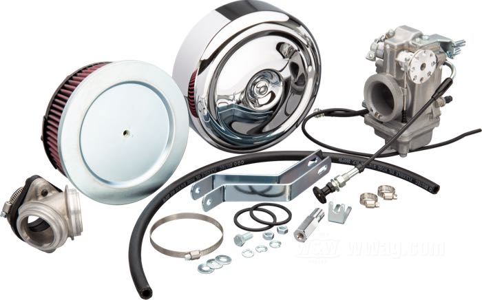 Carburatore a valvola »HSR42« di Mikuni; atto per Shovelhead 1966-1984; alluminio fuso / acciaio; con collettore, fascette e filtro aria con coperchio cromato; AVVERTENZA: usa cavi apertura/chiusura di 1990→; peso lordo: 2.88 kg