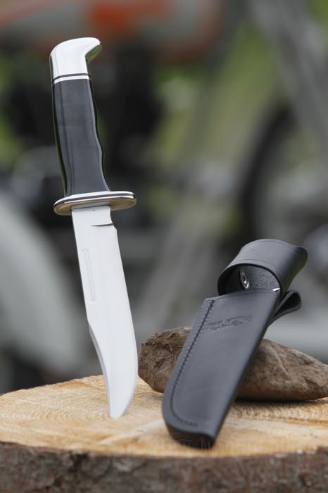 Couteau »119 Special« de Buck Knives; acier / bois; poids net: 213.5 g; longueur totale: 262 mm; longueur de lame: 152 mm; acier de lame: 420 HC; trempe de la lame: 58 HRC; avec étui en cuir noir; USA; poids brut: 350 g