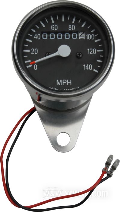 Tachimetro meccanico; atto per FL 1936-1967 e 1981-1984, FX/FXR 1973→, Sportster 1954-1994; cromato; Ø 60 mm; filettatura: M12 x 1.0; rapporto: 2:1 (2000 rpm = 60 mph); →140 mph; con supporto universale; peso lordo: 270 g